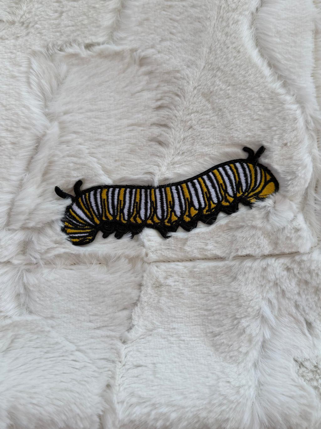 Leopard print with Caterpillar patch Minky Baby Blanket
